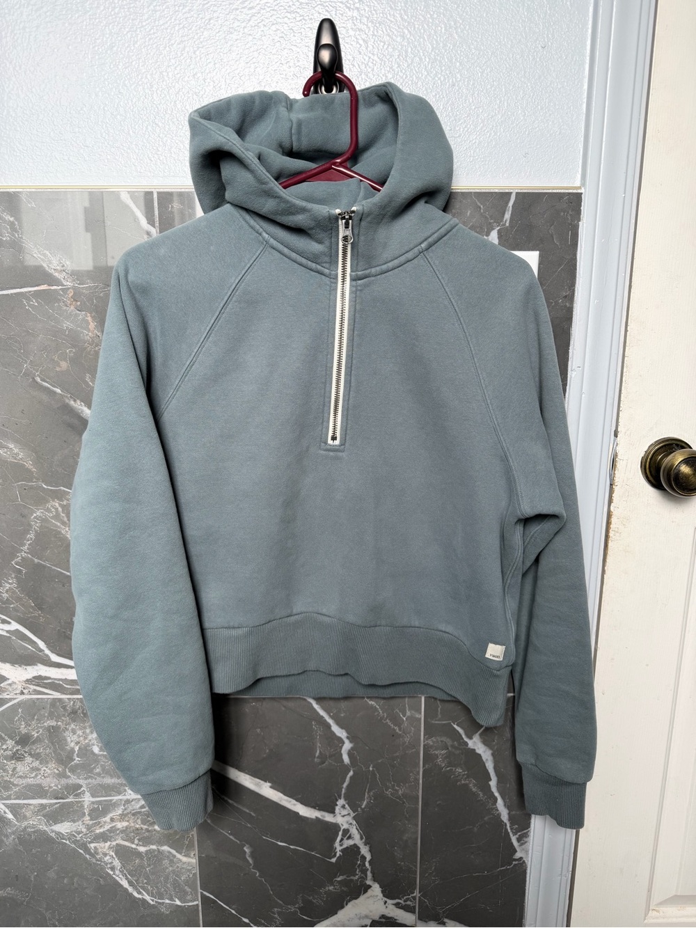 This is a Vuori Restore Half Zip Hoodie
